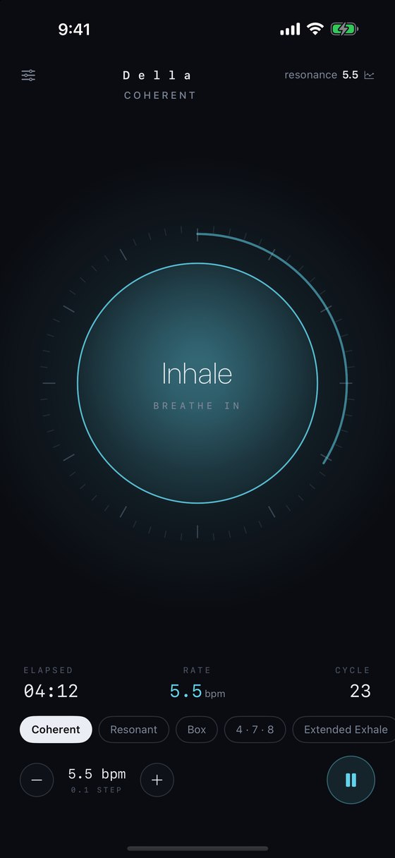 The Della breathing instrument on iPhone, a glowing disc mid-inhale